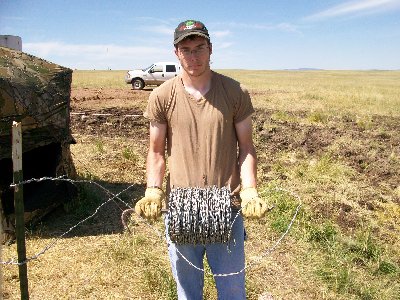 wire roll 50 lbs. carried to surround t posts
